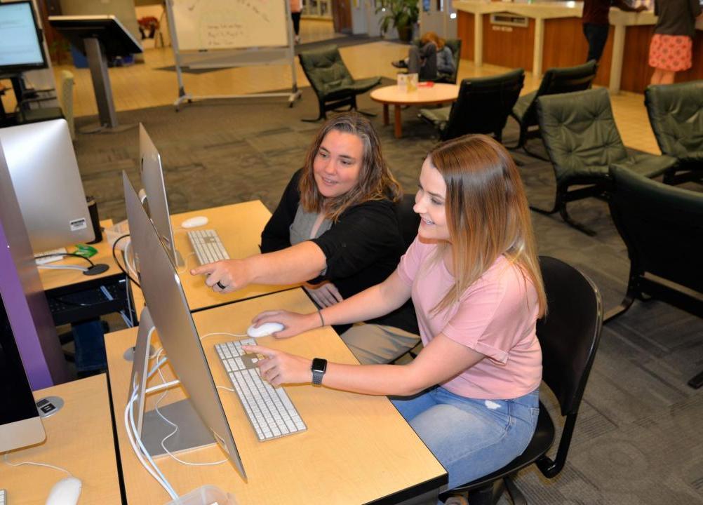 Students working at computers in the Library
